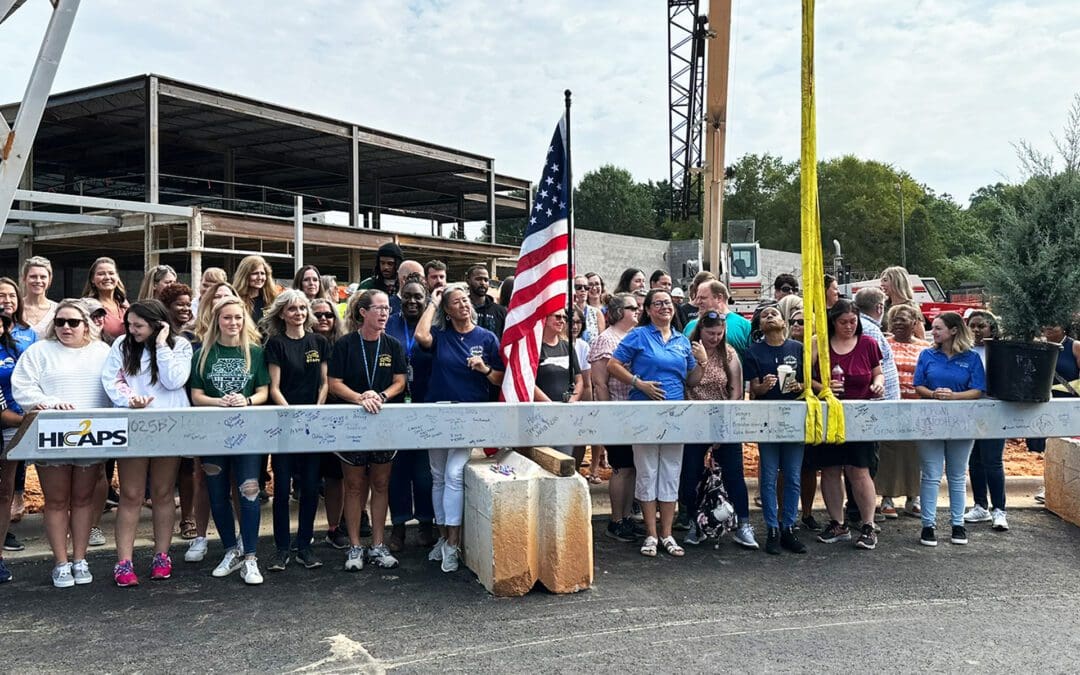 Community Gathers to Watch Topping Out at Claxton Elementary