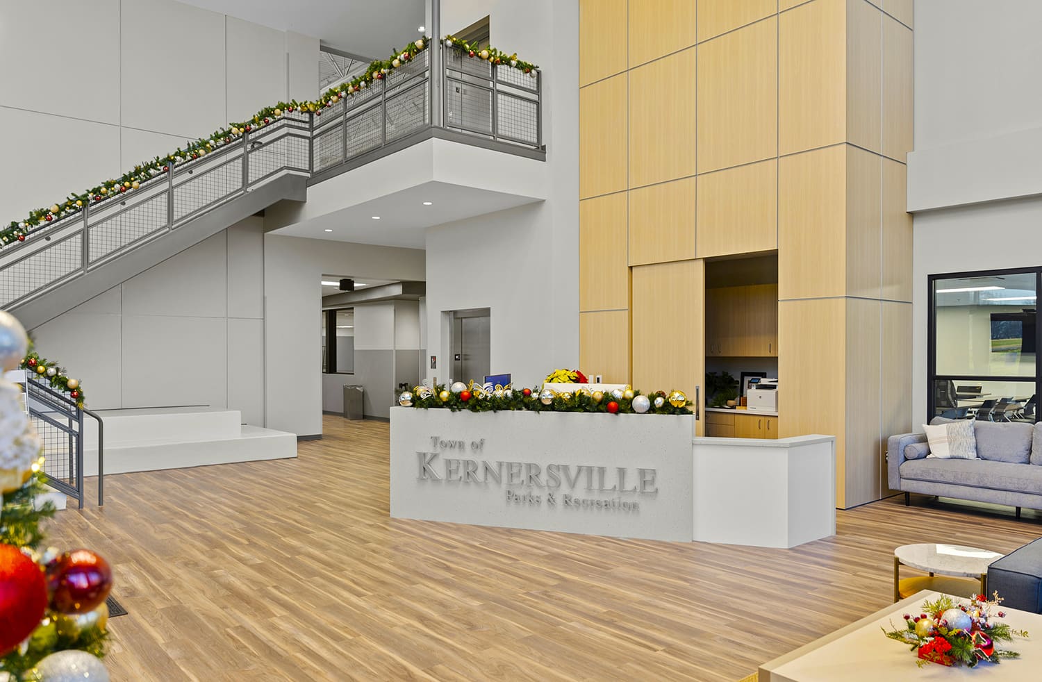 Samet Corporation team working on the Kernersville Recreation Lobby project, highlighting the construction and design of the entrance area