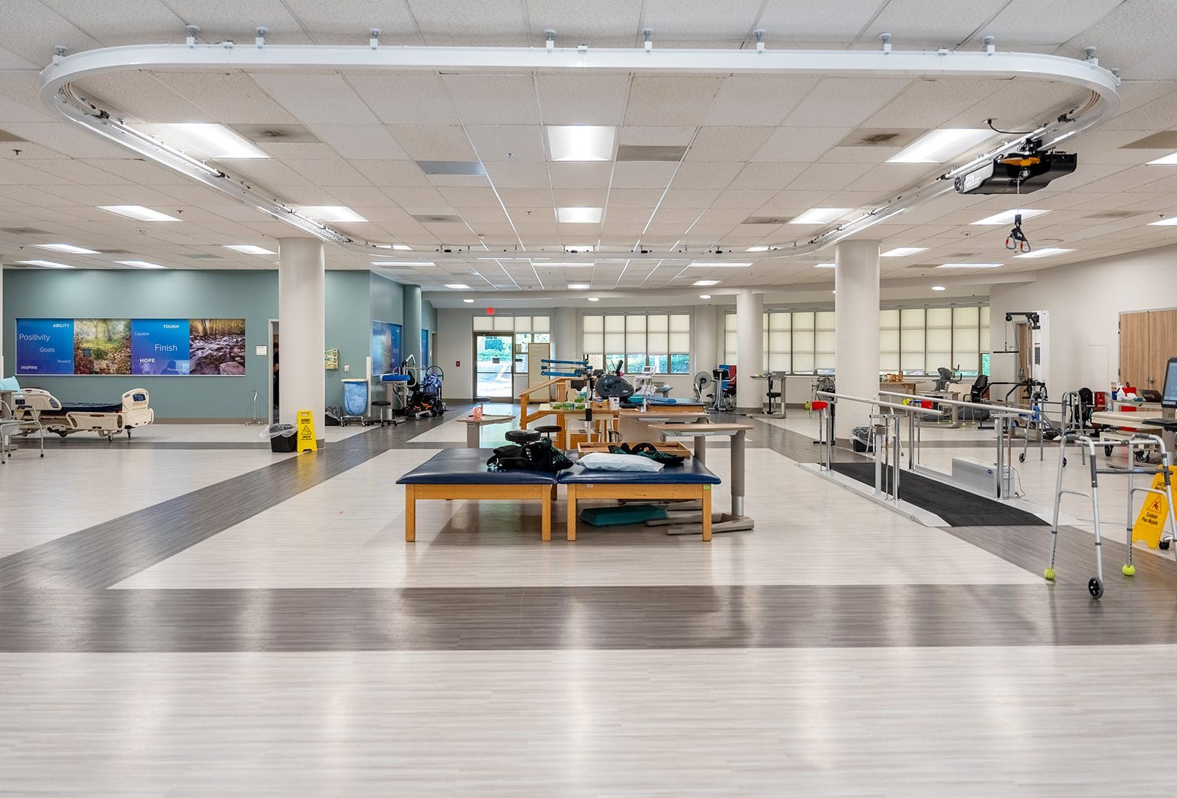 Samet Corporation team working on the Encompass Health Gym construction project, showcasing the development of the gym's interior space.