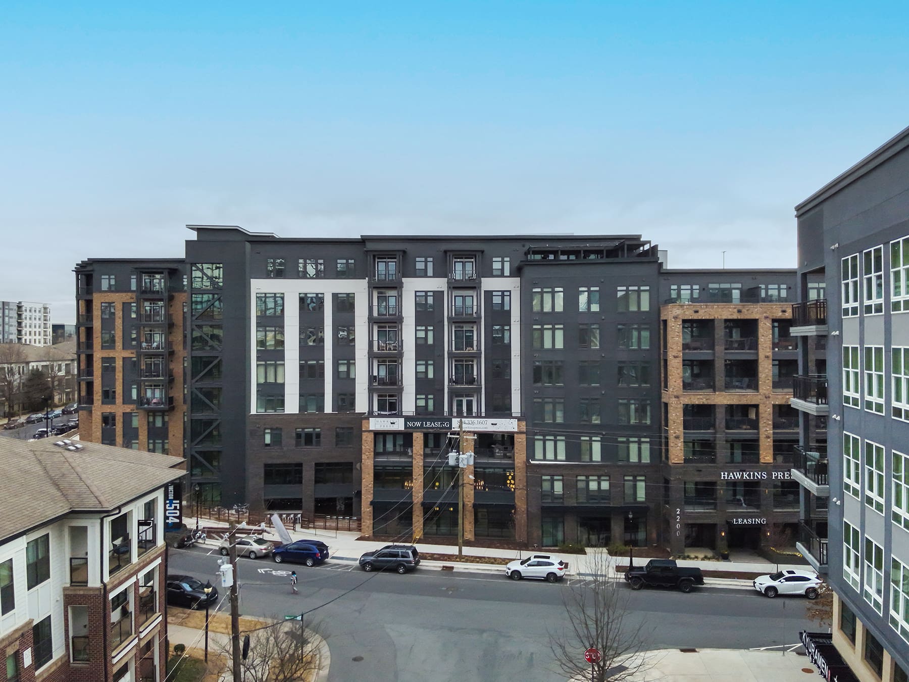 Exterior of Hawkins Press apartments in Charlotte’s South End