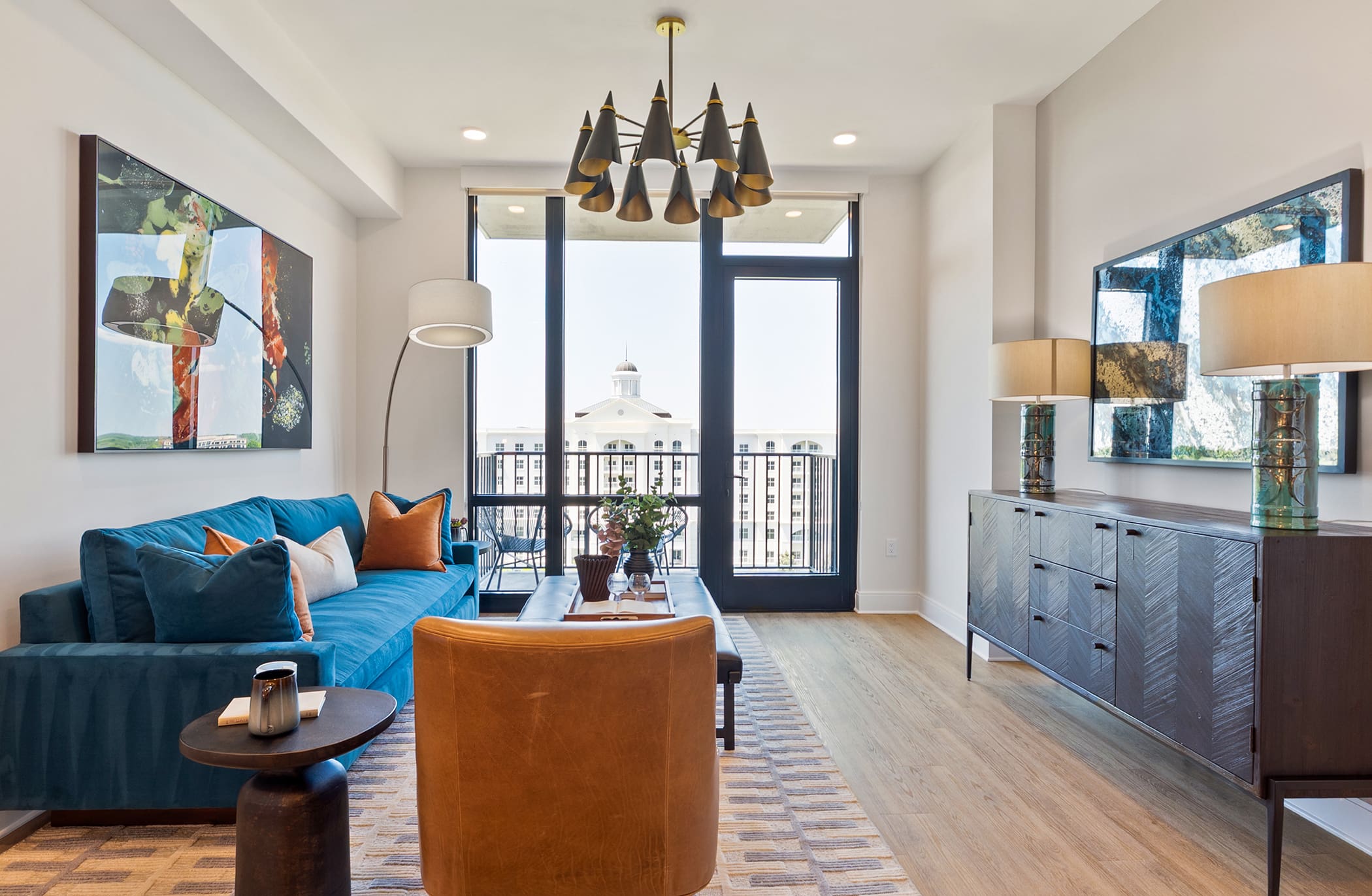 Upscale apartment kitchen and dining area with balcony access