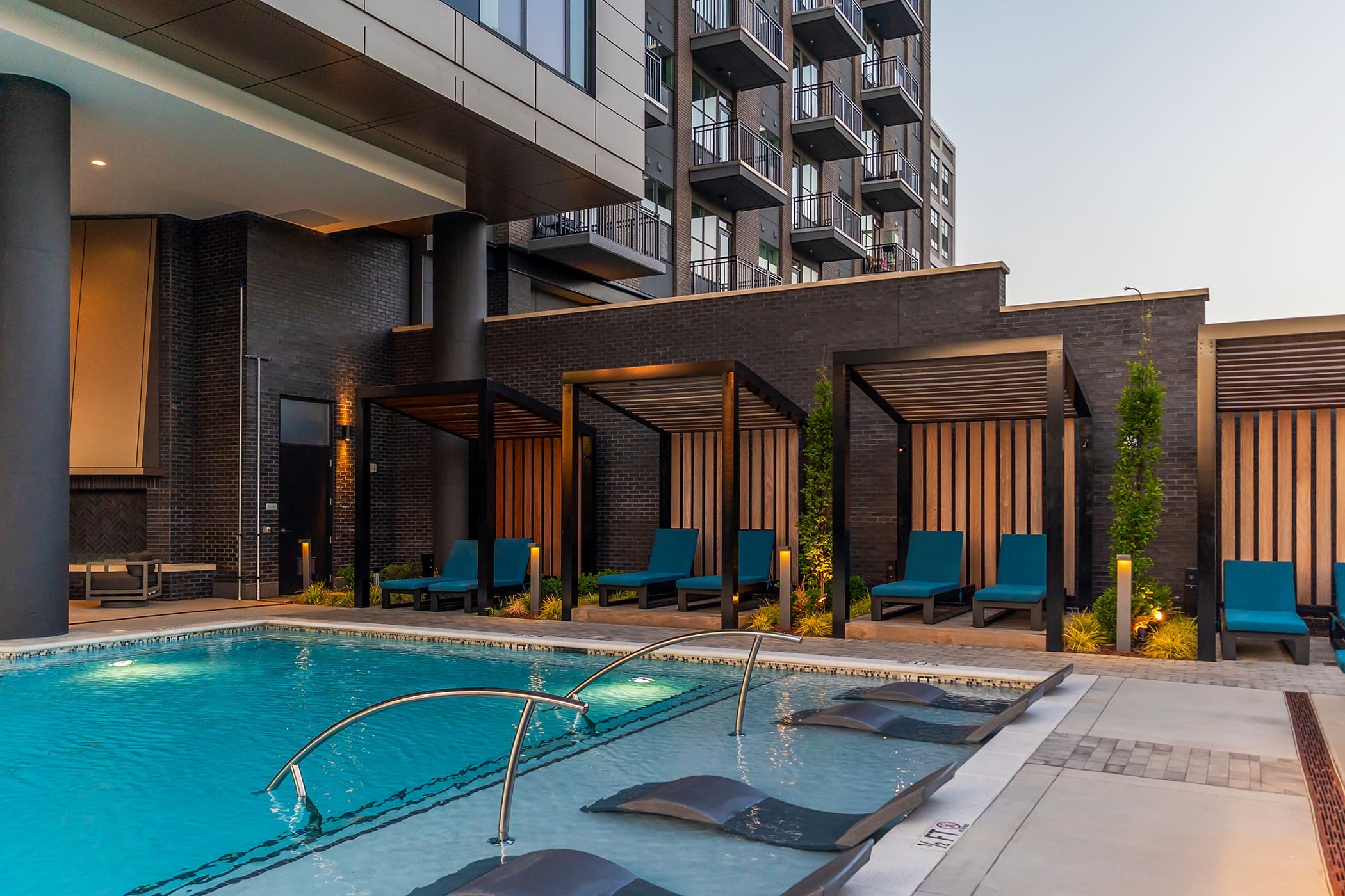 Apartment pool and spa area with private cabanas